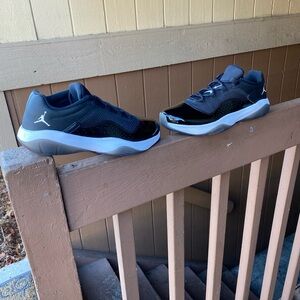 Jordan men’s Athletic Shoes in Black and White Jordan 11 CMFT Low